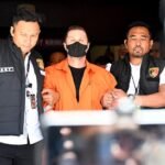 Penangkapan bos kejahatan asal Skotlandia ditunda untuk hari kedua di tengah operasi pencarian yang masih berlangsung